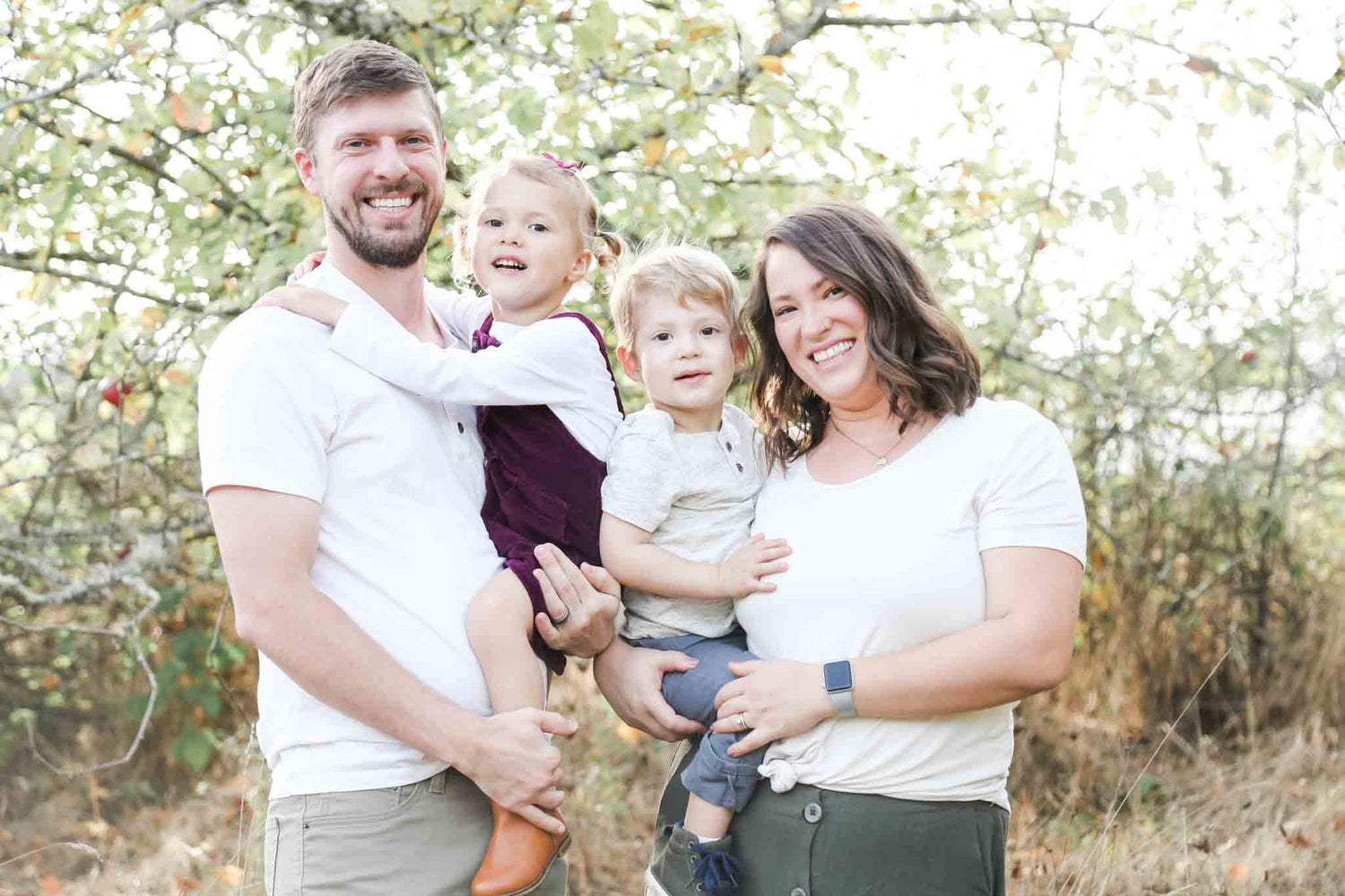 Ashley McGowan smiling with her family